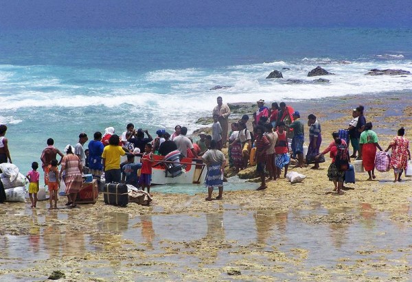 Cargo is offloaded from tenders that transfer passengers & cargo between the inter-island ferries and each of the outer islands of Tuvalu (here on the island of Niutao). A hazardous exercise, fraught with risk for passengers & the crew of the tenders. Photo by Cesqld.