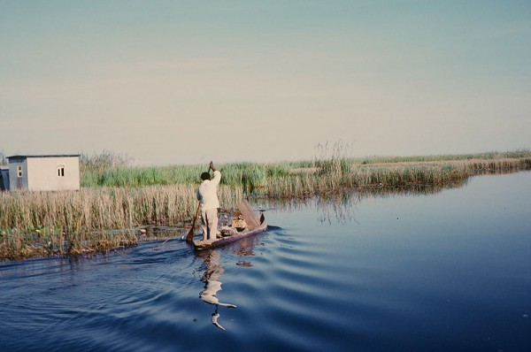 A resident fisherman enters Lukanga Swamp about 60 km west of Kabwe, Zambia. Photo DBrianWilson.